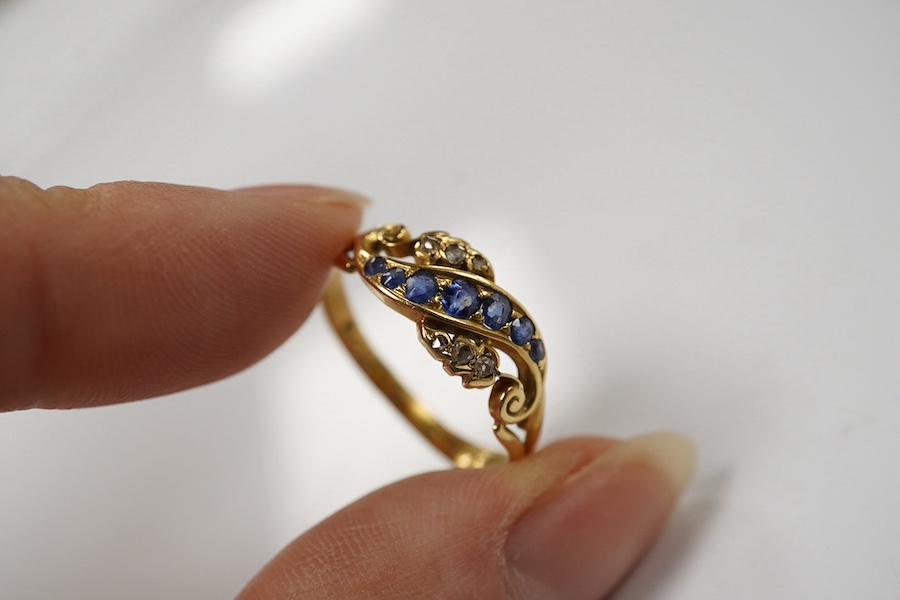 An 18ct white metal, sapphire and diamond set three stone ring, size L and two other sapphire and diamond rings, one late Victorian, gross weight 8.5 grams. Condition - fair to good